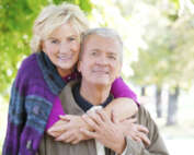 Elderly couple embracing